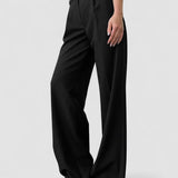 Pantaloni negri cu talie înaltă și croială largă