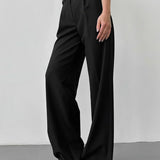 Pantaloni negri cu talie înaltă și croială largă