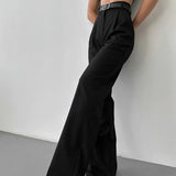 Pantaloni negri cu talie înaltă și croială largă