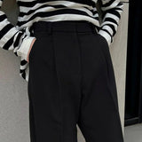 Pantaloni negri cu talie înaltă și croială largă