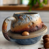 Cană Artizanală — "Bea Între Stele și Planete în Fiecare Zi"