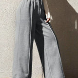 Pantaloni de trening largi, casual și eleganți pentru plimbări prin oraș